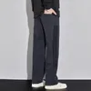 Calça masculina Moda coreana Loose Versátil Casual Men Stripe sólido Canda elástica Pockets Pockets de perna larga Larra esportiva reta