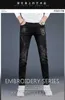 Mäns jeansdesigner 2021 broderade heta diamant jeans herrar casual smal fit byxor koreanska mode svart m8ib