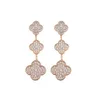 2024Fashion Brand Clover Diamond Earrings Luxury Crystal Full Diamond Three Flower Earrings Gift Rostfritt stål Högkvalitativt 18K Gulddesignerörhängen för kvinnor