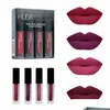 Lipgloss Huda Set Vier Farben Matt Wasserdicht Antihaft Nicht verblassende Lippenstifte Make-up Frauen Kosmetikpflege Großhandel Drop Lieferung Dhfu2