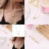 Andere Cross Europa en Amerika Mode 26 Engelse Letter Ketting Creatieve Perzik Hart Sleutelbeenketting Drop Delivery Otsvj