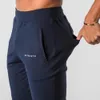 Pantaloni sportivi da corsa in cotone per allenamento muscolare Fitness Pantaloni sportivi casual traspiranti con bocca a fascio sottile 240130