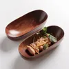 Tallrikar naturligt trä serveringsbricka matbord trä japansk stil för torkad fruktost sushi semester