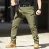 Jeans masculinos 2024 calças de carga táticas militares safari calças de trabalho multi-bolso impermeável caminhadas sprots ao ar livre para homens macacões soltos