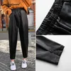 Calças femininas 2024 outono inverno preto falso couro elástico cintura feminina pu harem streetwear calças chiques