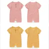 Rompers Summer Kids Bodysuit Kort ärm Pure Color Baby Rompersnitted Babbies med Button For Girl and Boy 1-2 år gammal