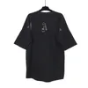 Nuovi top Estate T-shirt allentate Moda Camicia casual Luxurys Abbigliamento Street camicie carine Uomo Donna Alta qualità Unisex Coppia magliette TX0032