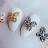 10 pz Love Butterfly Bottiglia di profumo Lega Nail Art Zircone Cristallo Metallo Manicure Unghie Accessori Forniture Decorazioni Charms 240202