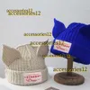 Gorras de bola Gorras de bola Moda con capucha Loverboy Ear Knit Hat Doble capa Otoño Invierno Cálido Cerdo Lana Diseño de nicho Hip-hop Gorro frío Sombrero de diseñador 2024