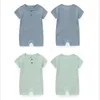 Rompers Summer Kids Bodysuit Kort ärm Pure Color Baby Rompersnitted Babbies med Button For Girl and Boy 1-2 år gammal