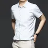 6XL, большая однотонная мужская рубашка с коротким рукавом, зимняя рубашка из ледяного шелка, без железа, роскошная длинная деловая повседневная рубашка, устойчивая к морщинам 240119