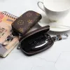 2024 Designer Men Universal Car Key Bags Case Unisex Manlig äkta Leather Key's Holder Women Zipper Smart Keychain Cases Cars Keys Pouch Bag