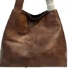 2024 mode miui väska bruna svarta väskor designer kvinnor väska kohud stor kapacitet tygväska hobo handhållen armhålväska