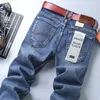 Jeans pour hommes 2024 automne et hiver épais droit mince élastique affaires décontracté style coréen pantalons de jeunesse hommes