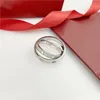 Cartão e anel de laço duplo Designer anel de aço inoxidável moda jóias homem anel de promessa de casamento presente da mulher271d