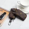 2024 Designer Men Universal Car Key Bags Case Unisex Manlig äkta Leather Key's Holder Women Zipper Smart Keychain Cases Cars Keys Pouch Bag