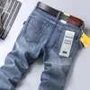 Jeans pour hommes 2024 automne et hiver épais droit mince élastique affaires décontracté style coréen pantalons de jeunesse hommes