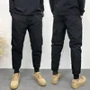 Mode Winter Men Down Cotton Pants Thick Warm Cargo Byxor Casual Drawstring Elastic Midje Svart Plus Size Menskläder 240124