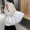 Borse a mano Borse a mano grandi Borse a mano in tela da donna casual Hobos creativi Maschera a tracolla Moda femminile Borsa da donna alla moda Shopper231Z