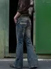 Jeans da uomo Punk Stlye Uomo svasato Baggy Bootcut Gamba Distressed Patchwork Denim Pantaloni Designer Pantaloni a campana Autunno Inverno