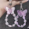 Nyckelringar Söt fjärilsblomma Keychain Fashion Transparent pärla Lanyard Keyring mobiltelefonkedja Kvinnor bil nyckelpåse hängande tjej gåva