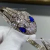 Desginer New Advanced Precision Craft v Gold Full Diamond Green Blue Eyed Double Headed Snake Open Bracet White Shell Peacock Stone Ring