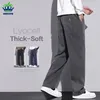 Pantalon pour hommes en tissu Lyocell doux et confortable amélioré Baggy taille élastique droite épais pantalon large décontracté mâle surdimensionné M-5XL 240125