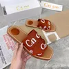 2024 Designer Womens Wooden Sandal Flat Bottomed Mule Slippers Multi-color Lace Letter Canvas Summer Home Shoes Luxury Brand Sandles Size Famous brand sandals