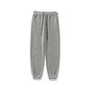 Calças masculinas primavera homens sweatpants sarja calças cônicas masculino cordão cintura moda longo corredores homem