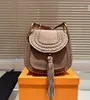 Tasarımcı Cowhide Omuz Çantası Lüks Marka Crossbody Çanta Kadınların Çanta Klasik Çanta Anahtar Çantası Moda Trendi Çantası