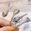 2024 Bulgarilies Armband Designer Kvinnor Toppkvalitet Full Diamond Snake Ring Women's Green Eyed Snake Head Double Head Snake Armband med justerbar öppning