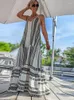 Casual Dresses Sexig V-ringad lapptäcke Halter Långt för kvinnor ärmlös rygglös tryck Vestidos Fashion Loose Robes 2024 sommar