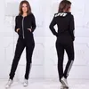 Pantalon de deux pièces pour femmes Survêtement rayé pour femmes 2 tenues décontractées à manches longues veste zippée ensemble de sport sweats à capuche pantalons de survêtement costumes de survêtement