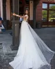 Delicate Lace A Line Wedding Dresses With Illusion Long Sleeves Sheer Neck Boho Beach Bridal Gowns Sweep Train Sexy Thigh Split Bride Reception Robes de Mariee CL3287