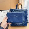 Sac à dos en denim de lavage pour femmes de créateur avec poignée supérieure 30x35cm Matériel argenté Chaîne en matelasse Treillis de diamant Grand sac à main à bandoulière avec sac à main à fermeture éclair