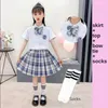 Kläder sätter skola tonåring flicka uniform barn veckade kjolar japanska hög midja a-line pläd kjol jk uniformer gratis slips och strumpa