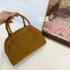 Autumn and winter frosted suede niche high-end Boston pillow bag, bento velvet half month hand-held crossbody small bag 240205