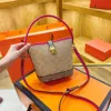 Bolsa feminina estampada francesa avançada, versátil, casual, de um ombro, crossbody, 2024, 78% de desconto, atacado da loja