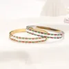 Bracciale rigido di marca di moda con stampa di lettere di design da donna in acciaio inossidabile placcato oro, ideale per gioielli da sposa, regali d'amore romantici