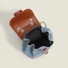 Sacs d'école 2024 mignon style coréen denim cuir cordon de serrage sac à dos petit mini sac avec bracelet en métal simple minimaliste tendance française