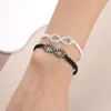 Bracelets de charme 12pcs / Set Ensemble Forever Love Infinity Bracelet pour les amoureux Blanc / Noir String Couple Femmes Hommes Souhait Bijoux Cadeau