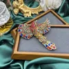 Broches Vintage moyen femmes hommes coloré strass oiseau luxe broches broches palais baroque perroquet cristal unisexe Badges accessoires