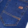 Jeans da uomo d'affari casual elasticizzati dritti moda classico blu nero pantaloni da lavoro in denim maschile marchio di abbigliamento 240130