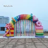 Nome dell'articolo wholesale Arco arcobaleno gonfiabile all'aperto 7m 23ft Arco colorato di caramella curvo di esplosione dell'aria di larghezza per la decorazione dell'ingresso del parco e del circo