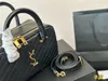 23ss ny stil kvinnor resväska lady liya tote 7a toppkvalitet axelväska lyx designer bagage väska bowling väska äkta läder handväska affärsduffle väska