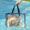 ストレージバッグファッション女性クリアトートPVCレーザー防水透明なハンドバッグ