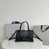 Hourglass Luxurys Marques Sacs à bandoulière Femmes Gaufrage Messenger Sac Original Haute Qualité Designers De Luxe Sacs À Main Femmes Mode Été Véritable Sac À Main En Cuir