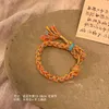 チャームブレスレットUMQ中国チベットスタイルの手織りロープ民族多色のタッセル国立ブレスレットホリデーギフト