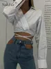 Damesblouses Nadafair Turn-Down Kraag Shirts Lange mouwen Chic Cropped Tops 2024 Casual Witte tailleband Bandage Sexy Vrouwen