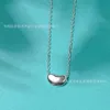 Designer Tiffanyjewelry Tiffanybracelet T Colar de feijão da família 925 Pingente de feijão de prata de prata